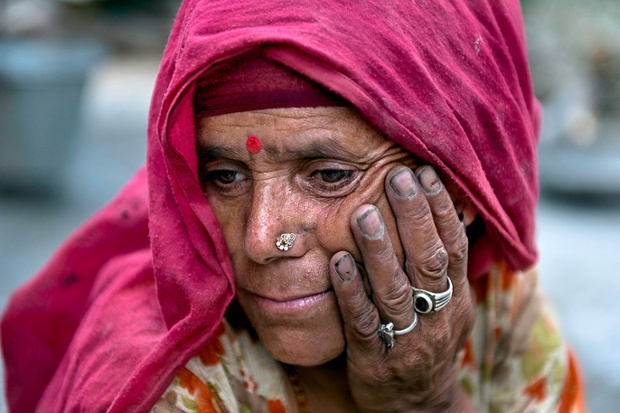 Subadra Devi, aged 40, works on a construction site in Dharamsala, India.